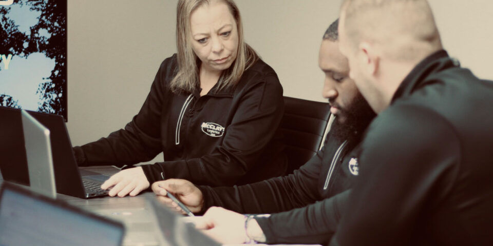 McClay's logistics team reviewing documents